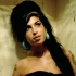 Sotul lui Amy Winehouse facea bani buni din...saruturi